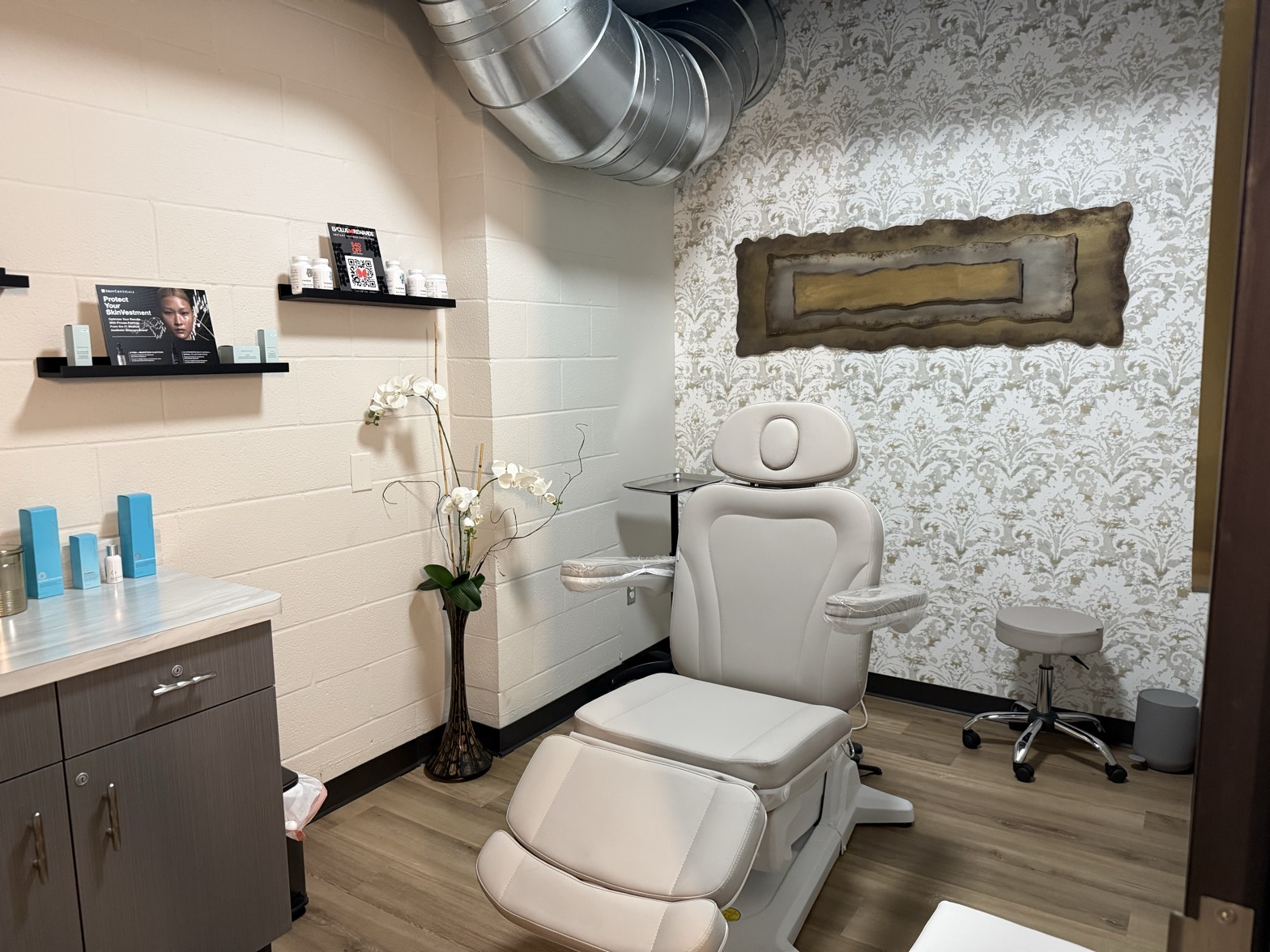 Treatment room with SkinCeuticals professional skincare at The Skin Cliniq